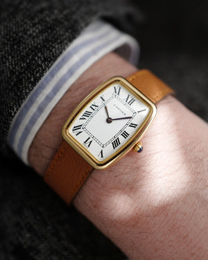 1970s Cartier Incurvée | Faberge Mark 1 Dial - Early Production | Paris Dial | Mécanique | 18kr Yellow Gold | With Box and Two New Straps