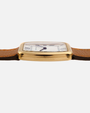 1970s Cartier Incurvée | Faberge Mark 1 Dial - Early Production | Paris Dial | Mécanique | 18kr Yellow Gold | With Box and Two New Straps