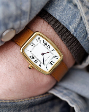 1970s Cartier Incurvée | Faberge Mark 1 Dial - Early Production | Paris Dial | Mécanique | 18kr Yellow Gold | With Box and Two New Straps